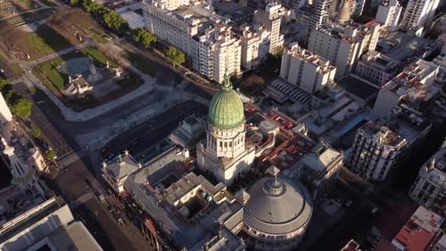 Aerial top-down circling over Palace of Argentine National Congress dome at Buenos Aires