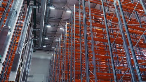 Lines of Empty Racks in New Spacious Plant Warehouse
