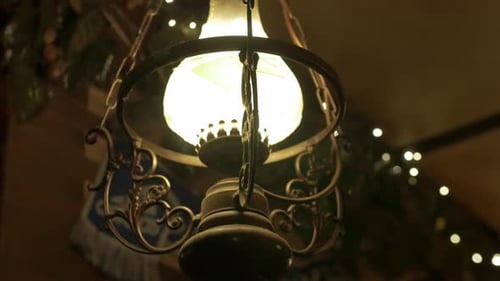 An old style lamp in a pub