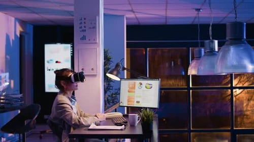 Woman Working with VR Headset in Modern Office