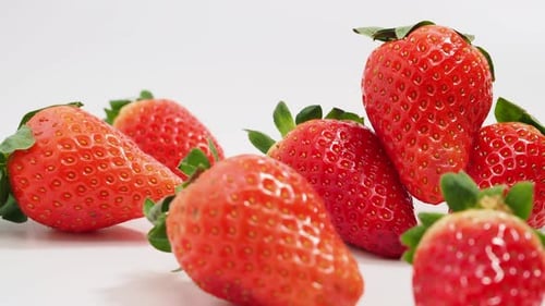 Ripe strawberries on a white background. Strawberries close up.
