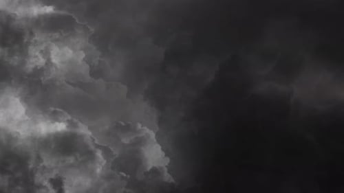 Turbulent Dark Storm Clouds Billowing in Motion
