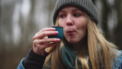 Trip to Forest in Fall Day Portrait of Happy Beautiful Woman Drinking Hot Tea Female Traveler