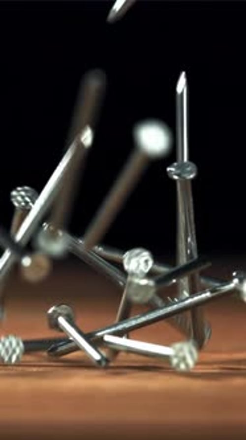 Nails Fall on the Carpenter's Worktable Filmed on a Highspeed Camera at 1000 Fps