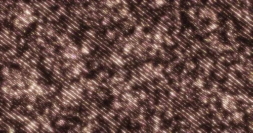 Abstract background of flying yellow gold sand stripes and diagonal lines with a glow effect shiny f