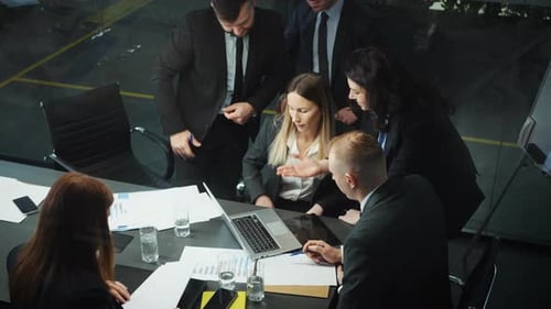 Young Adults at a Business Meeting in Office