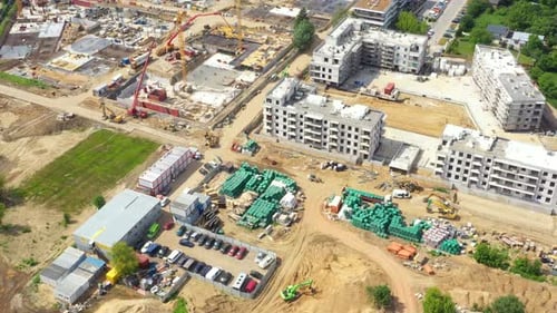 Aerial view of a new house building on a construction site.
