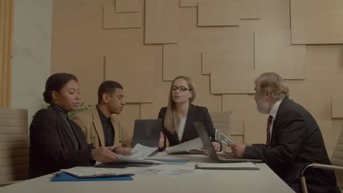 Business Team Meeting in Modern Office Space