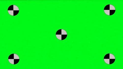 Robotic arm holding green screen for chroma key