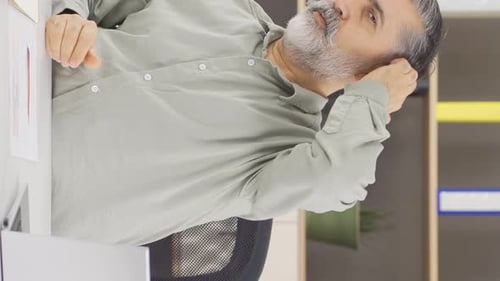 Vertical video of Handsome charismatic businessman.