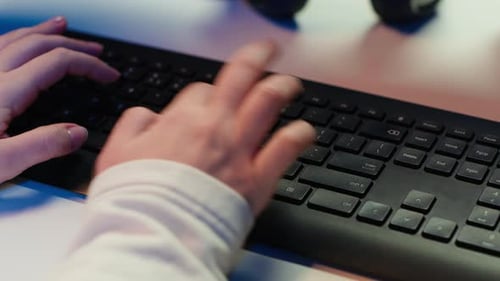 IT Specialist Typing on PC Keyboard Close Up