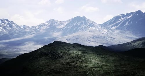 Majestic Mountain Landscape Under a Clear Sky with Distant Peaks