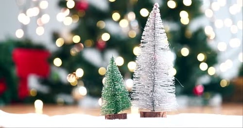 Festive Miniature Christmas Trees with Holiday Background