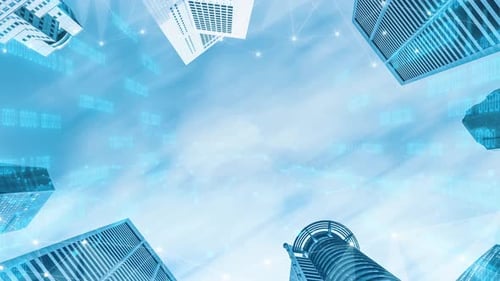 Low angle graphic of city buildings and data