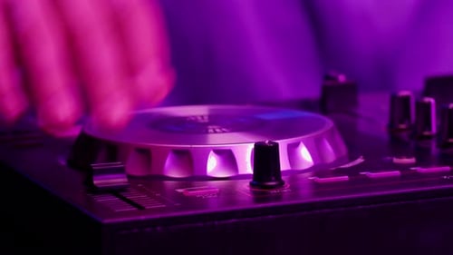 Vibrant DJ Mix Performance Closeup View of Hands and Equipment During a Live Music Performance City