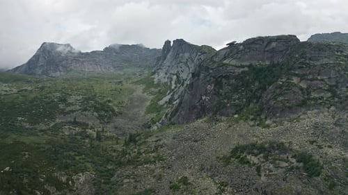 A Majestic Landscape of Towering Rocky Mountains Reaching the Sky