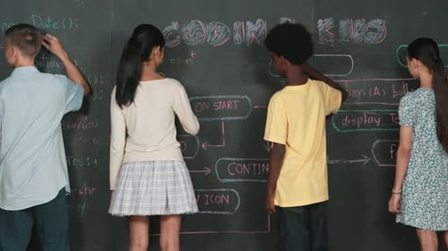 Diverse children planning to code program by using blackboard. Edification