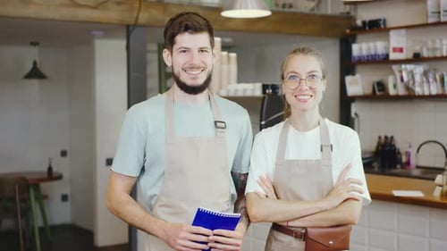 Cheerful Baristas Create an Inviting and Cozy Coffee Shop Environment Filled with Artisan Beverages