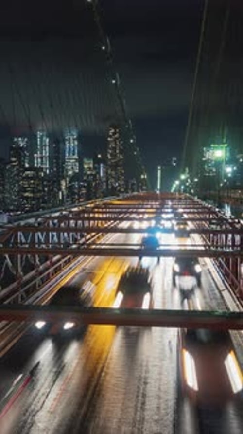 Intense Traffic on the Brooklyn Bridge in New York City at the End of the Workday The Lights of