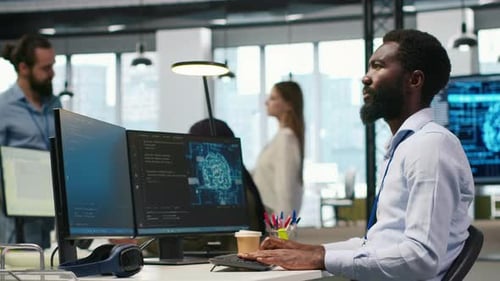 System Administrator in Office Using PC Automating Repetitive Tasks with AI