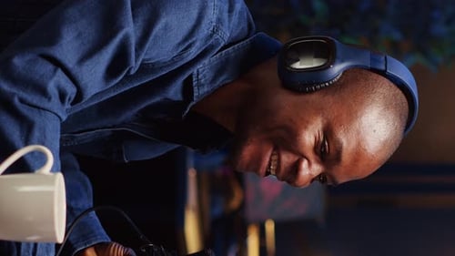 Vertical Video Man Recording Podcast Adjusting Microphone to Ensure Optimum Sound Quality