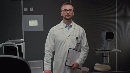 Doctor Standing in Optometry Examination Room