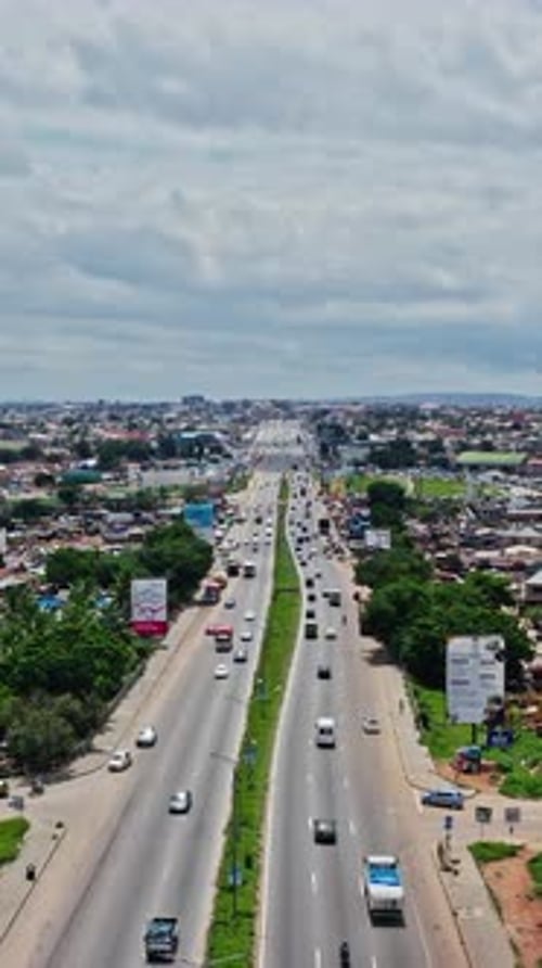 Aerial view of busy highway in Accra, Ghana on a cloudy day