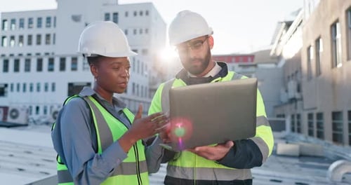 Construction worker, laptop and people with talking and teamwork on rooftop for contractor