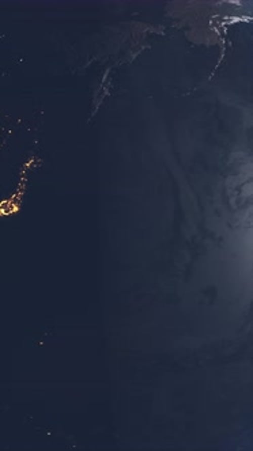 Vertical Video View from Space of Asia and Europe Continents with City Lights Visible