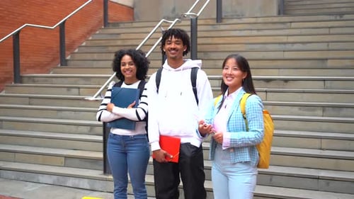 Happy Students Posing Smiling at Camera in the Campus