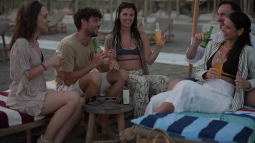 Friends Enjoying Drinks at the Beach