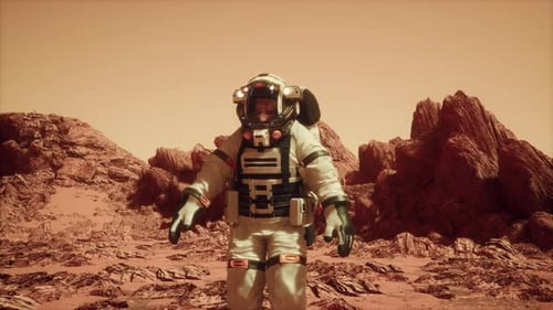 Astronaut Walking Across Rocky Mars Terrain 5