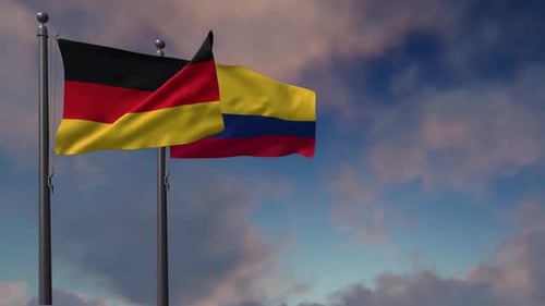 Germany and Colombia National Flags Waving on Flagpoles