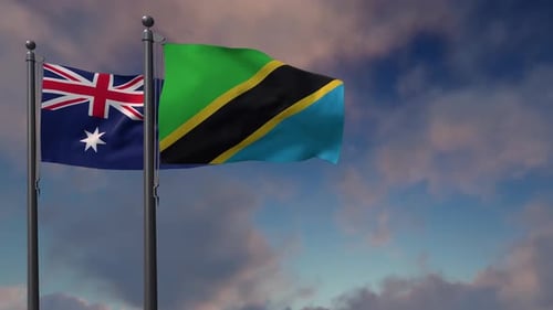 Australia and Tanzania National Flags Waving on Poles