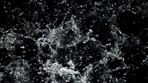 Abstract water splash on black background, slow motion