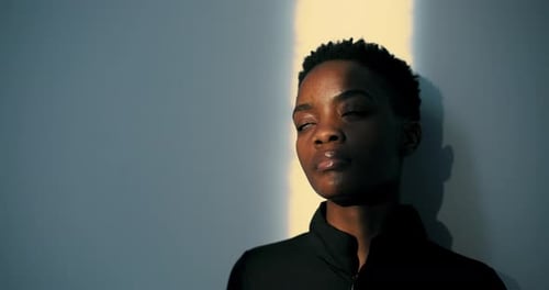 Woman Bathed in Golden Light, Close-Up