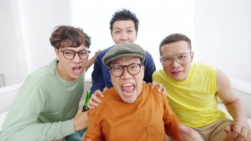 Excited Friends Celebrate Together Indoors