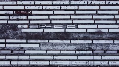 Winter Aerial View of Snow Covered Train Yard