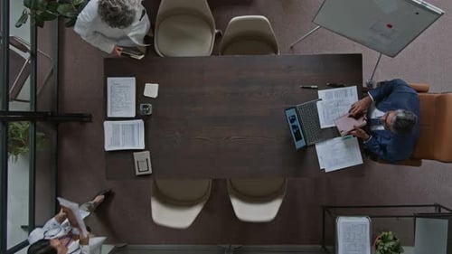 Top View of Doctors Arriving for Meeting with Clinic Director and Shaking Hands