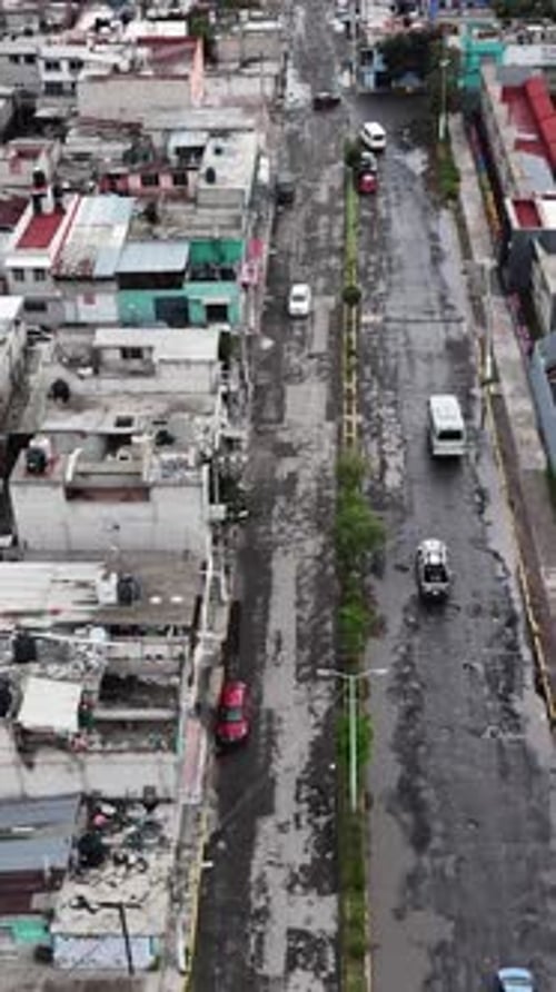 Drone captures rough streets in Ecatepec, Mexico. Vertical screen
