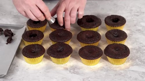 Filling in Chocolate Cupcakes with Chocolate Ganache