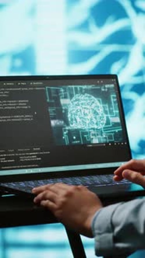Vertical Video AI Computer Scientist Using Laptop for Business Data Analysis in High Tech Workspace