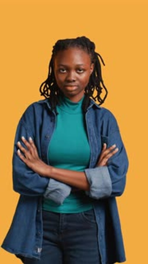 Vertical Video Cheerful Teenager with Positive Wellbeing Feeling Optimistic Studio Background