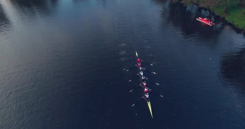 Rowing Boat racing in Competition on small Alster Lake with Aerial Drone shot