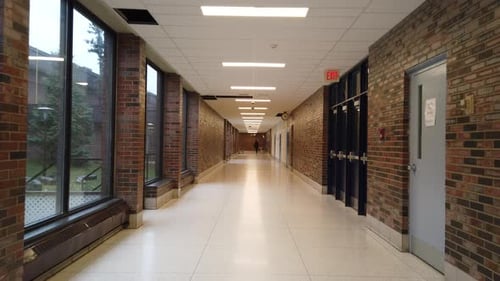 High school hallway brick walls