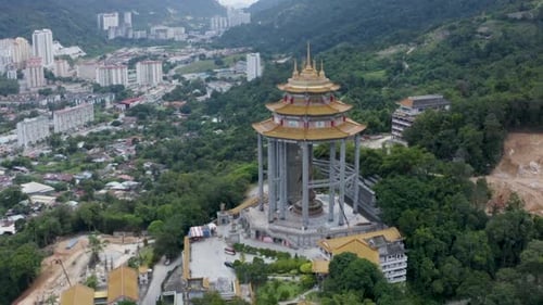 Beautiful tracking shot Kek Lok Si Temple, Kuan Yin statue, Penang Hill Malaysia total view, aerial