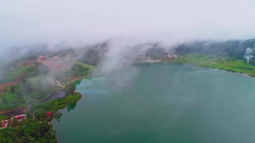 Aerial view of misty lake linao