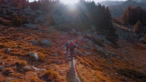 Hiker Explores the Beautiful Pyrenees Landscape in Spain During Sunset