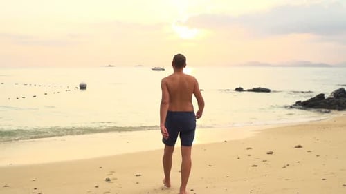 Young Man Walking on Beach, Super 240