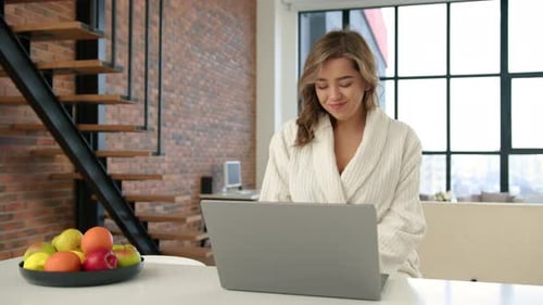 Cozy Home Office Ambiance with Woman Enjoying Work Life
